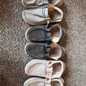 Hey Dude Black, Gray, and Cream Shoe Collection